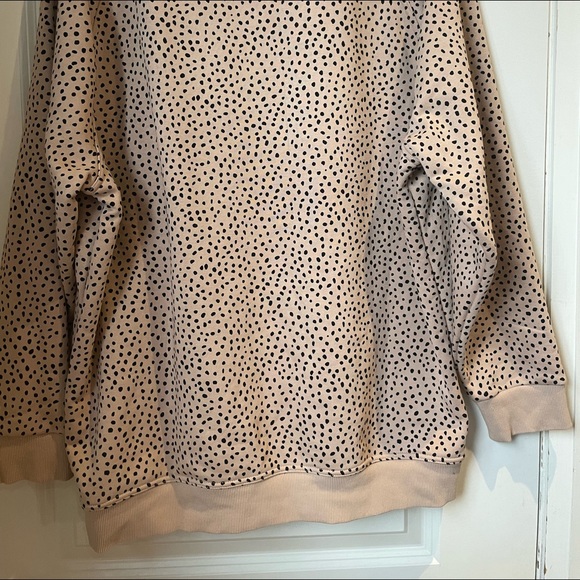 This is a long sleeve top from SDXWFA. It’s a US size large. - Picture 4 of 5